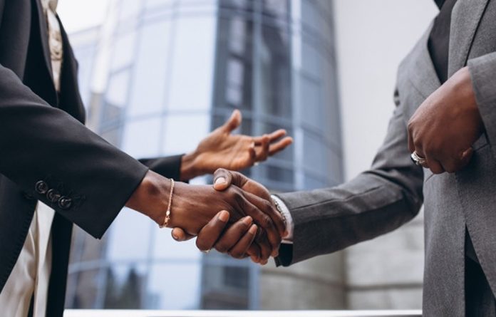 African People Shaking Hands